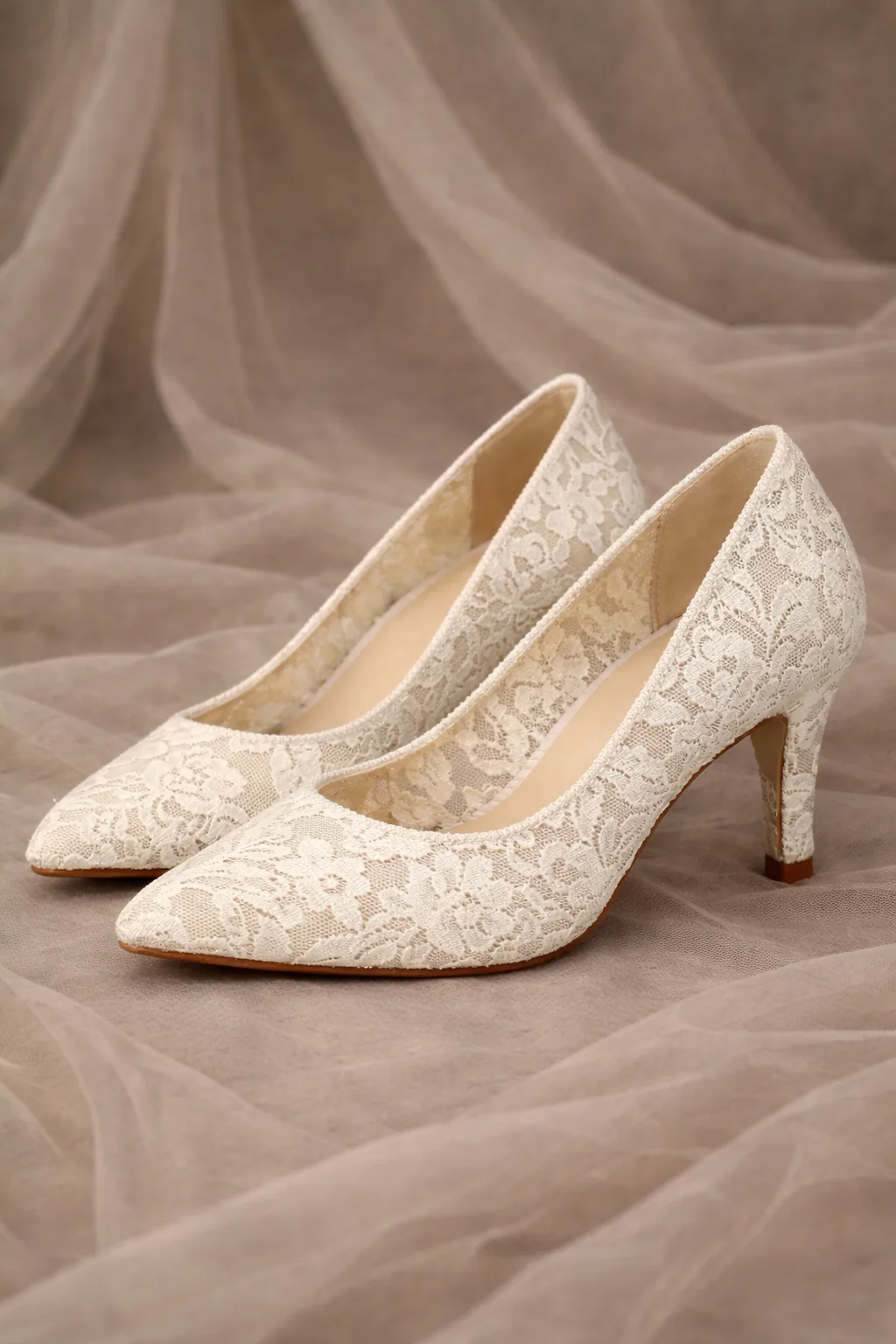 Lace texture bridal heels with pointed toe and slim heel for comfortable wedding wear