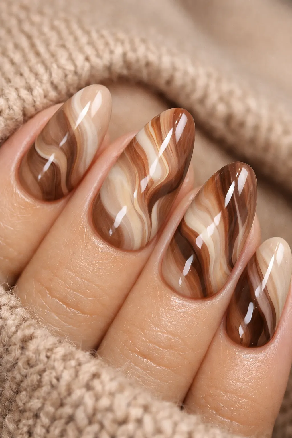 mocha marble swirl almond gel nails brown neutral glossy manicure
