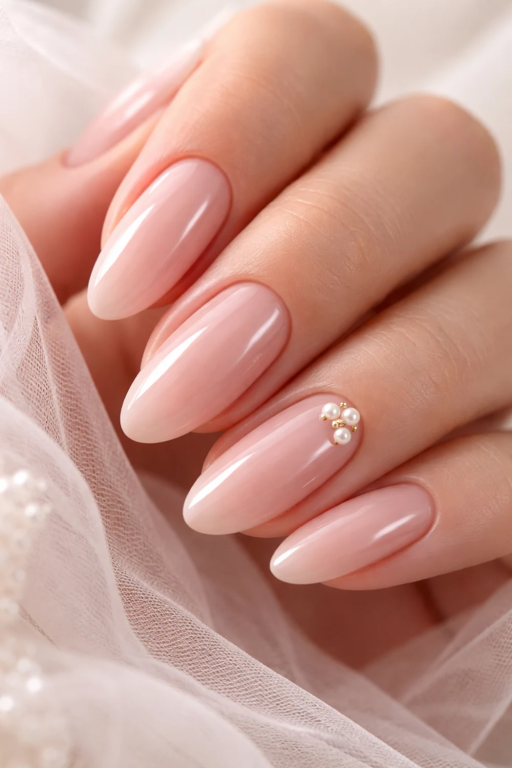 blush nude nails with pearl accent bridal formal manicure elegant feminine nail design