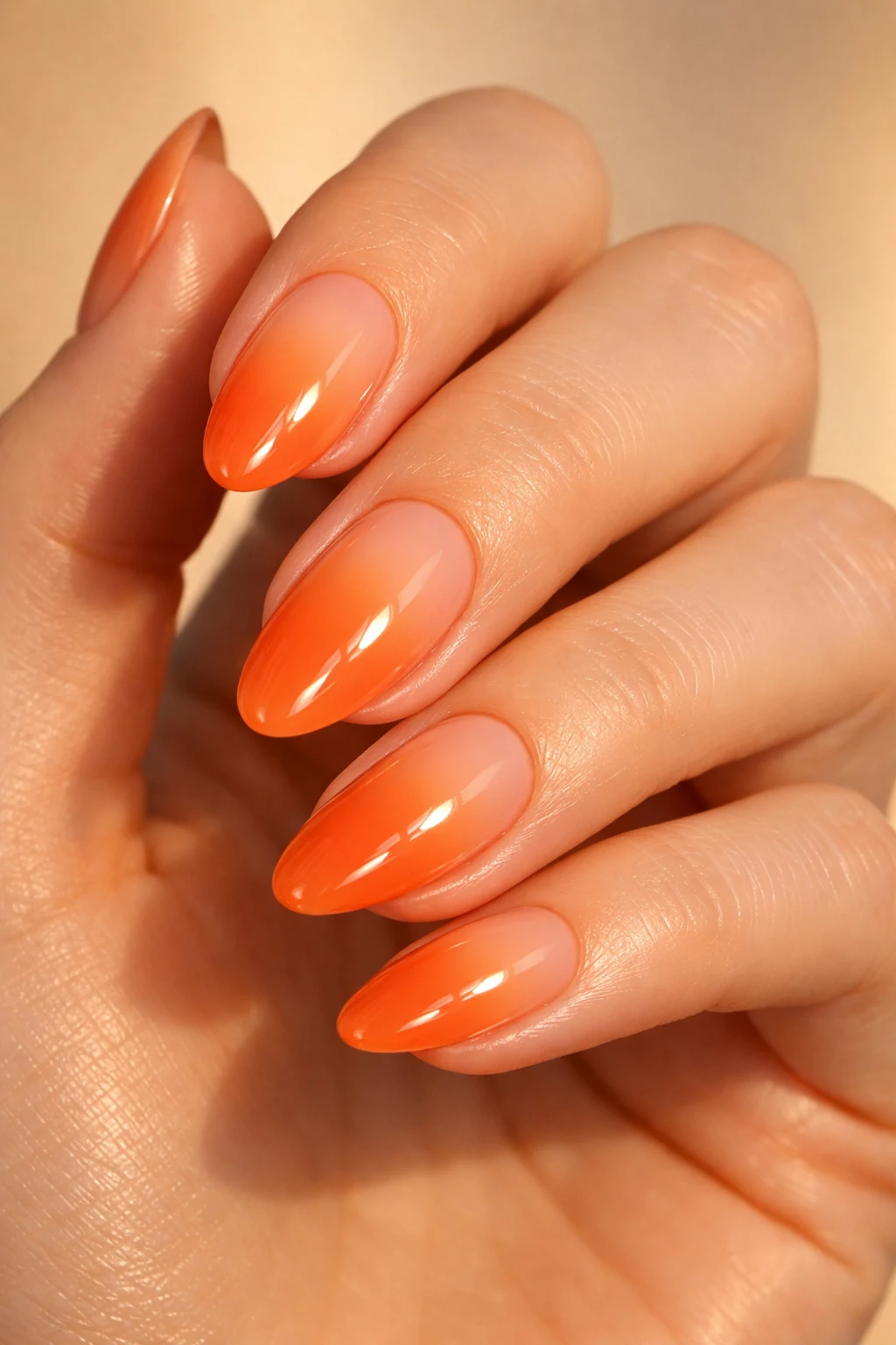 Nude to orange ombre gradient nails sunset inspired glossy summer manicure design