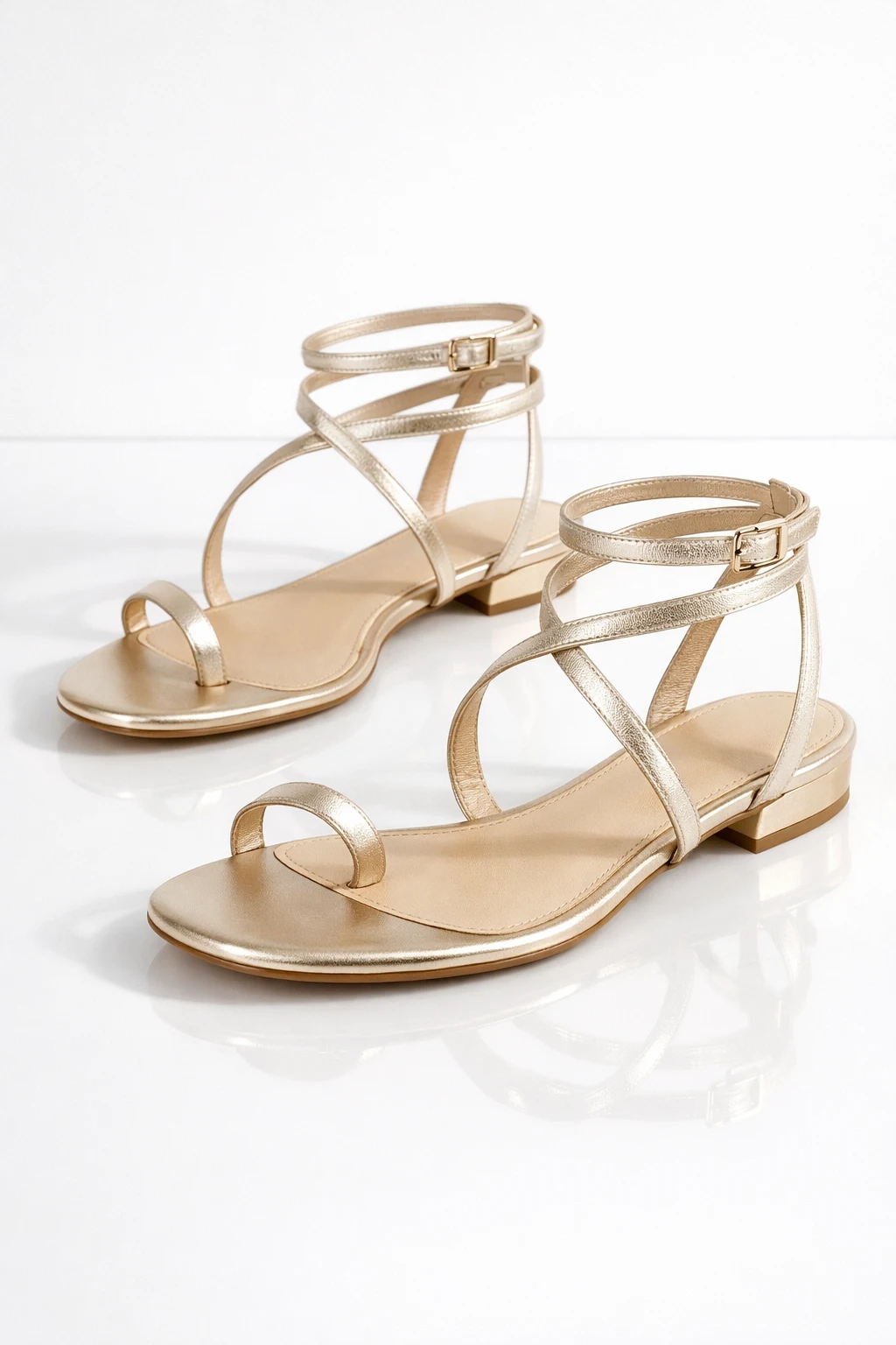 Gold strappy low heel girls sandal with ankle wrap strap design