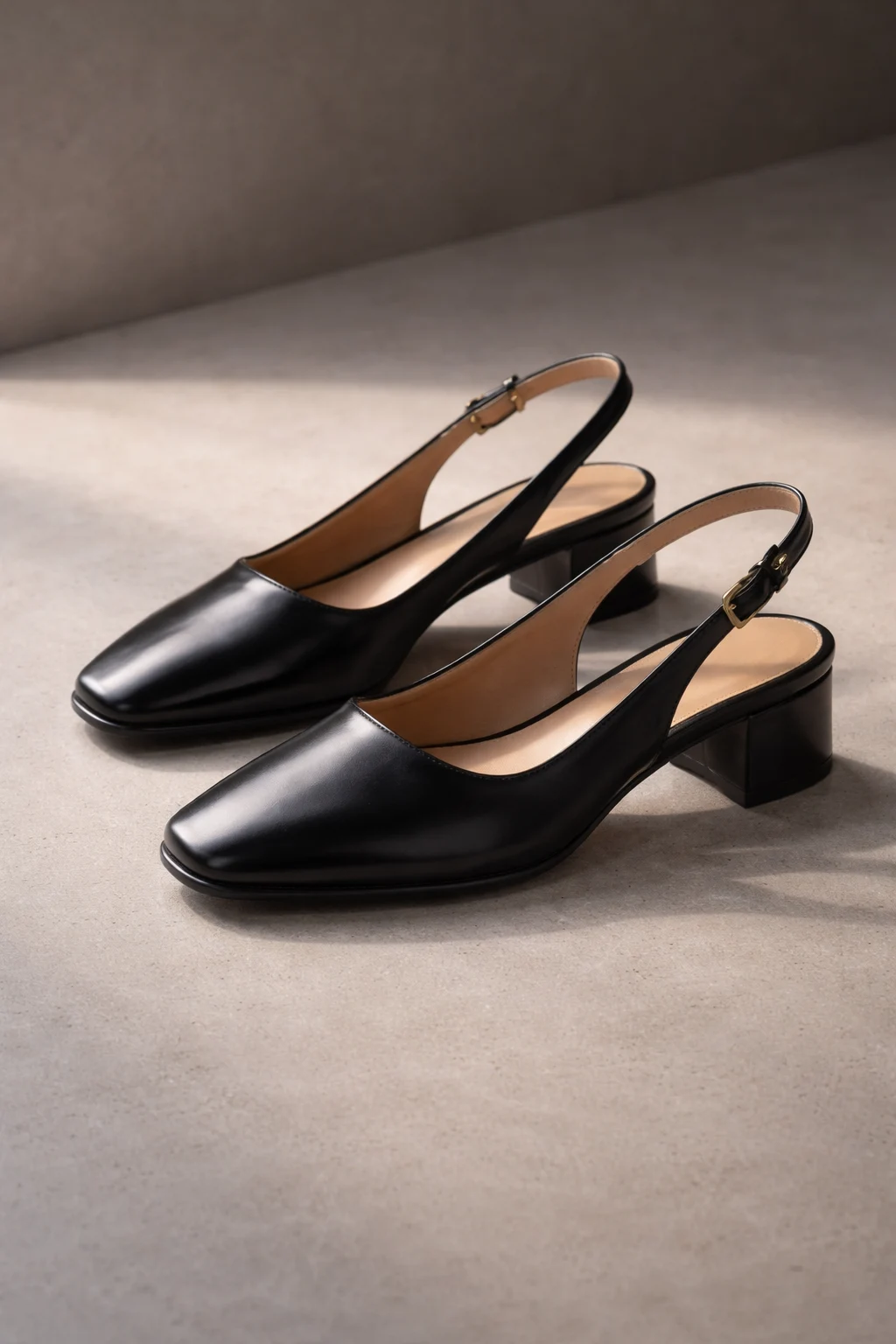 Black slingback low heel girls sandal with closed front design