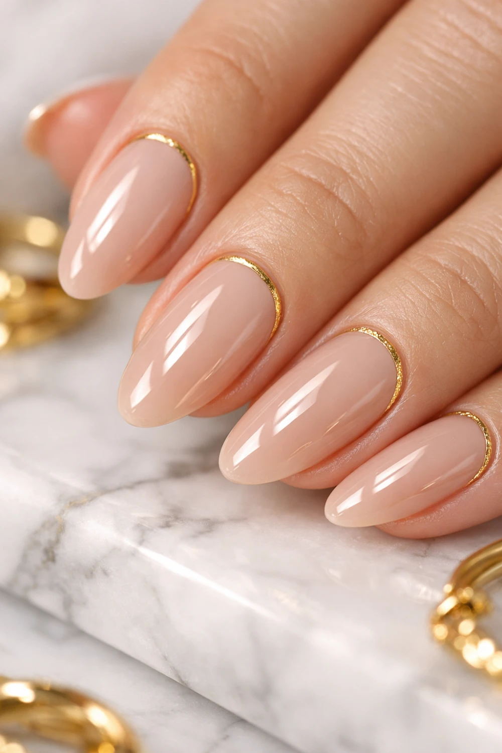 nude nails with gold cuticle detail luxury formal manicure elegant neutral nail trend