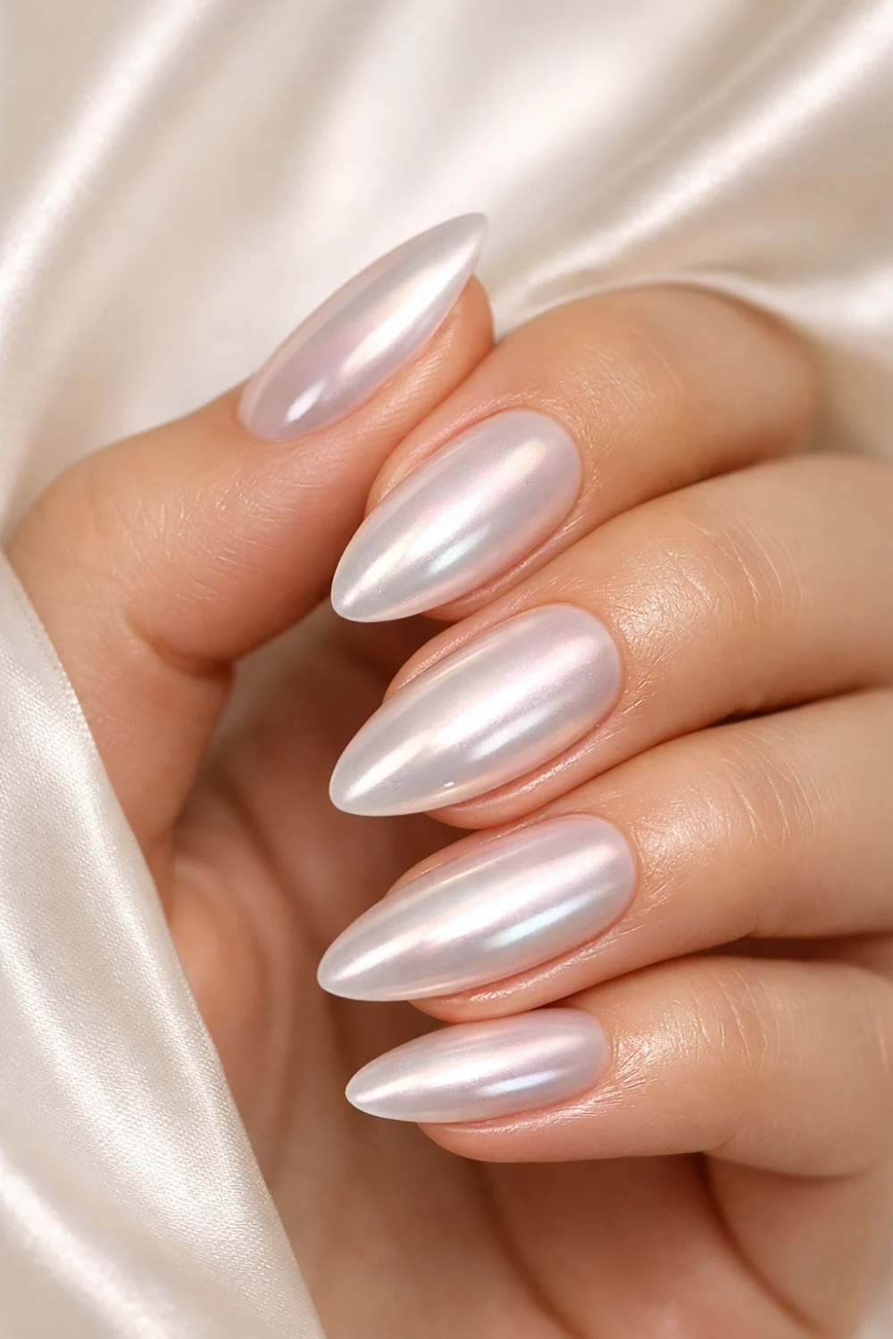 pearl glazed nude almond nails chrome glossy formal manicure trending glazed nails