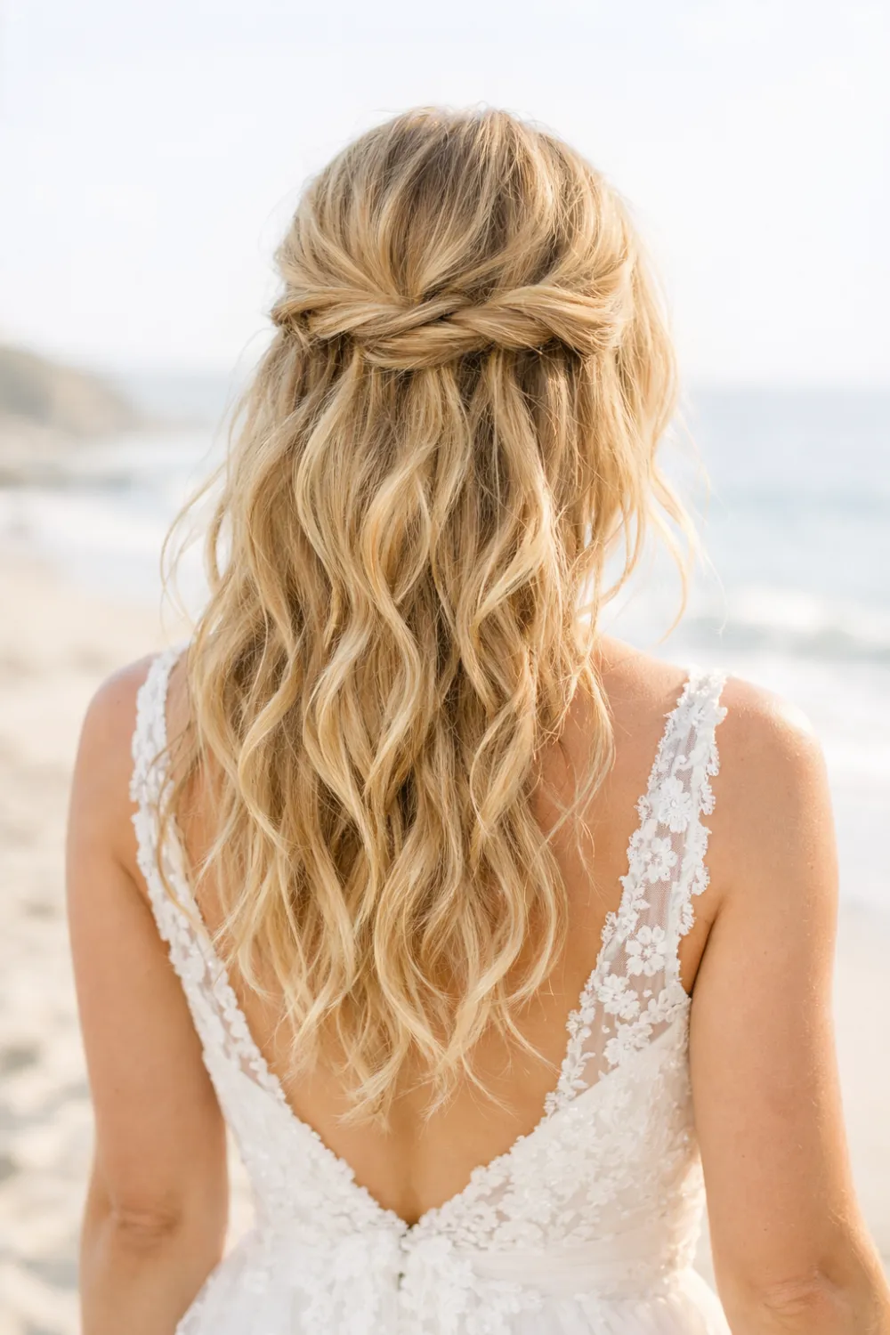beachy textured half up half down wedding hairstyle with loose waves