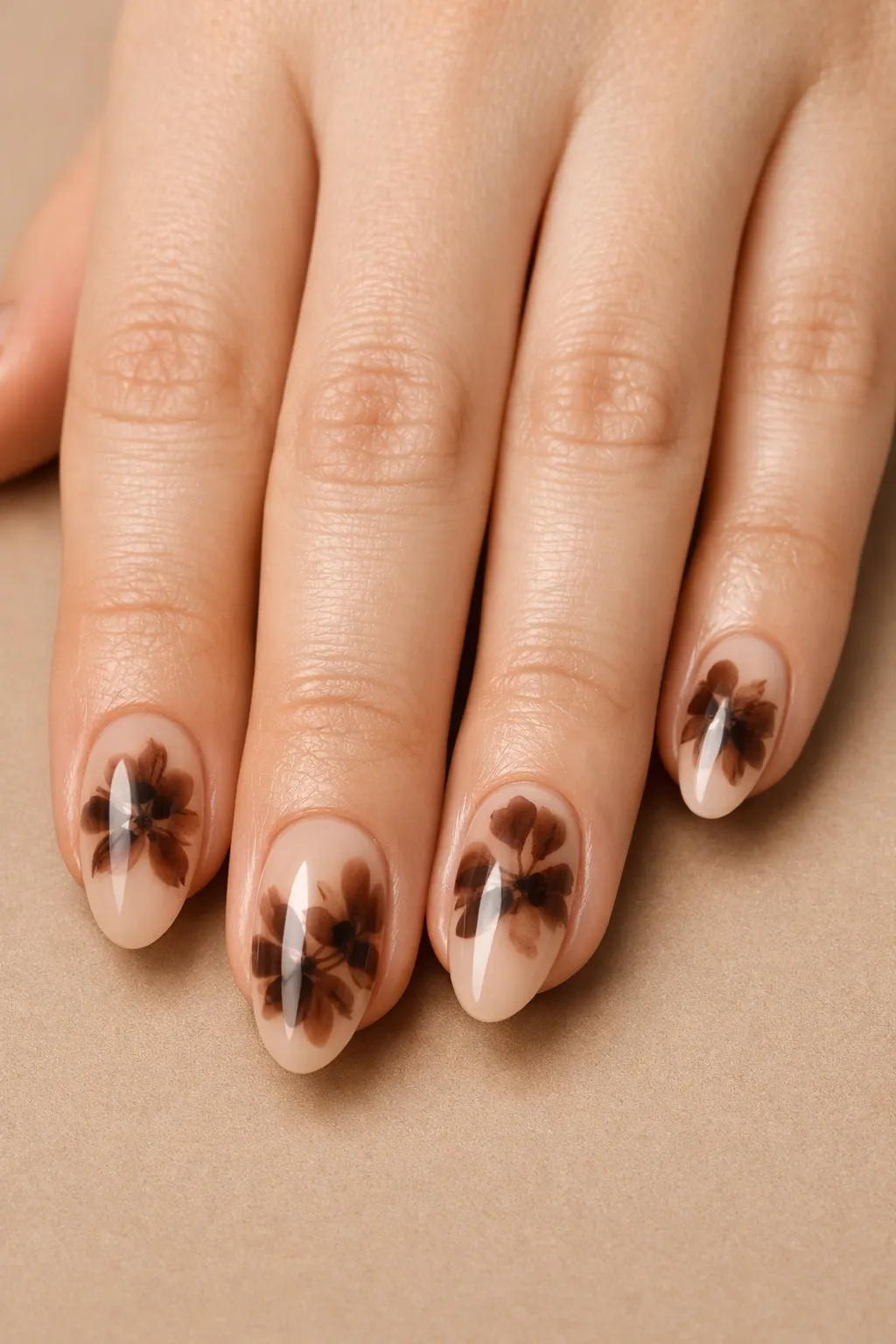 Mocha brown floral blooming gel nail art on nude base elegant manicure