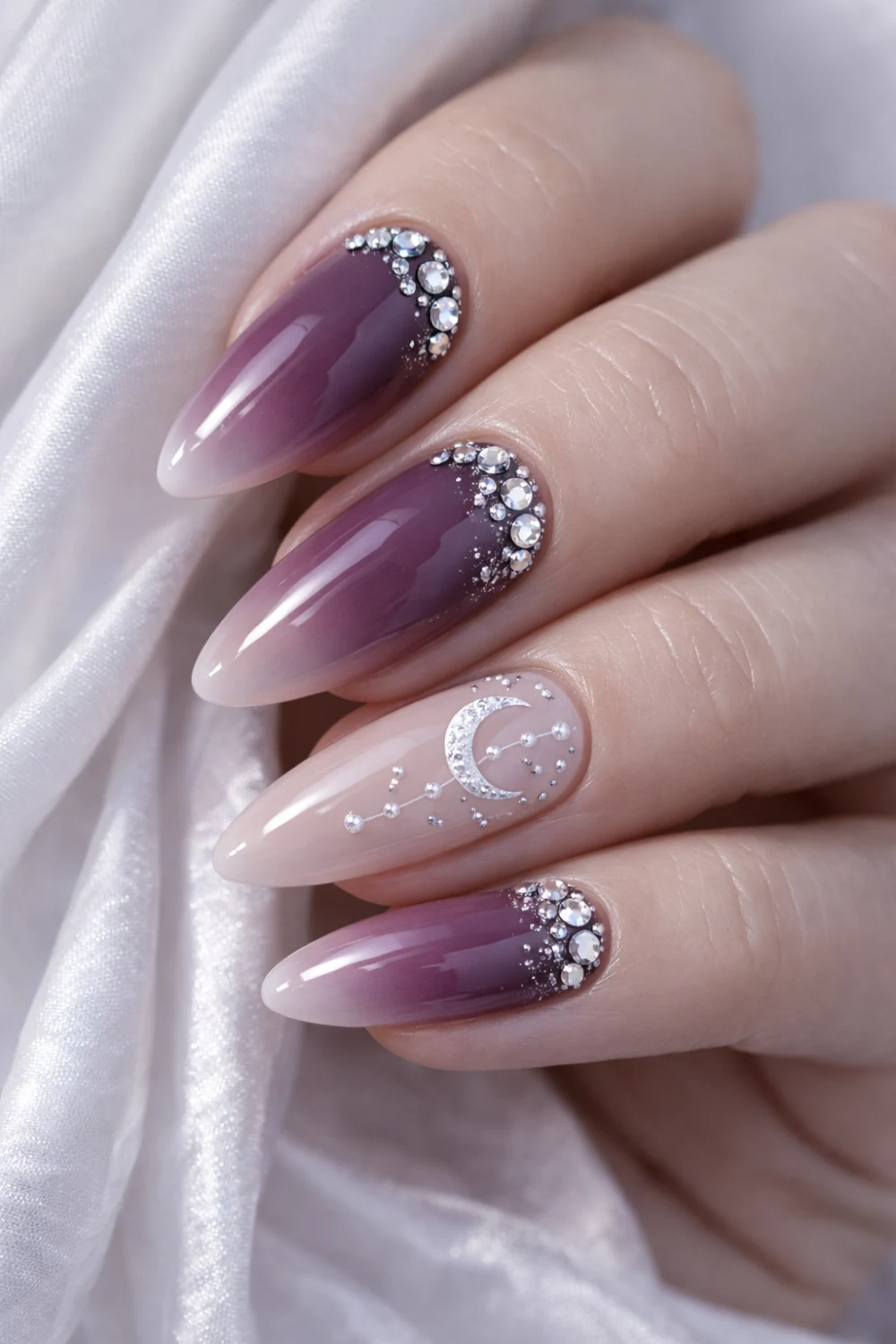 purple ombre nails with crystals and moon star nail design aesthetic