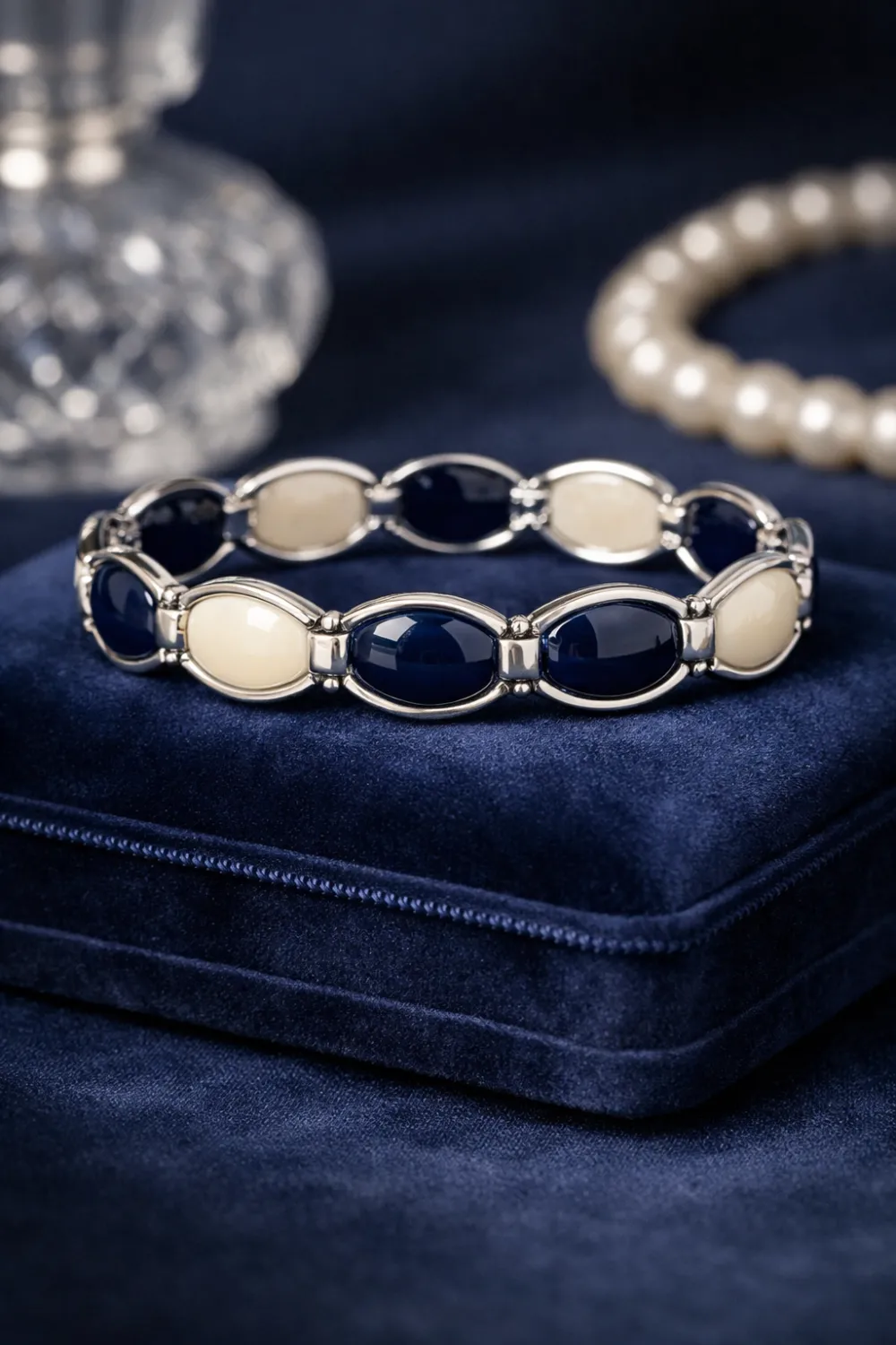 vintage enamel link bracelet elegant old money jewelry featuring navy and ivory enamel panels with polished silver links luxury bracelet design