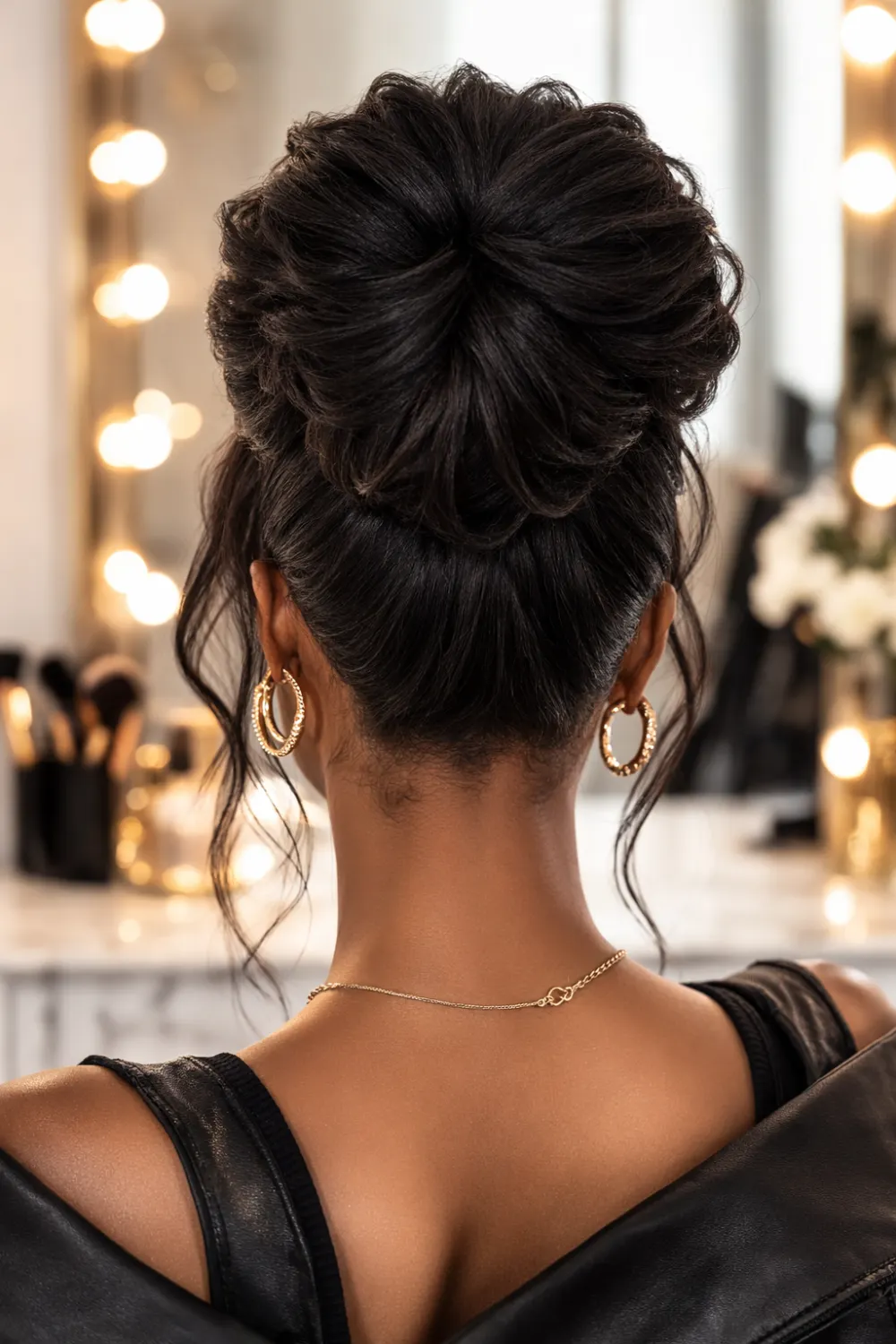 high voluminous textured elegant updo glamorous hairstyle