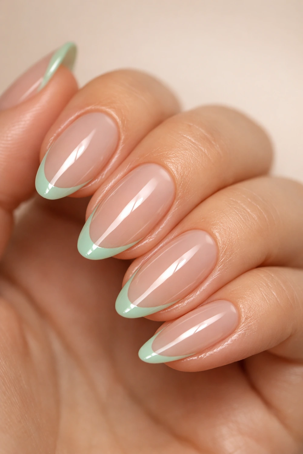 mint green french tip almond nails glossy spring manicure design