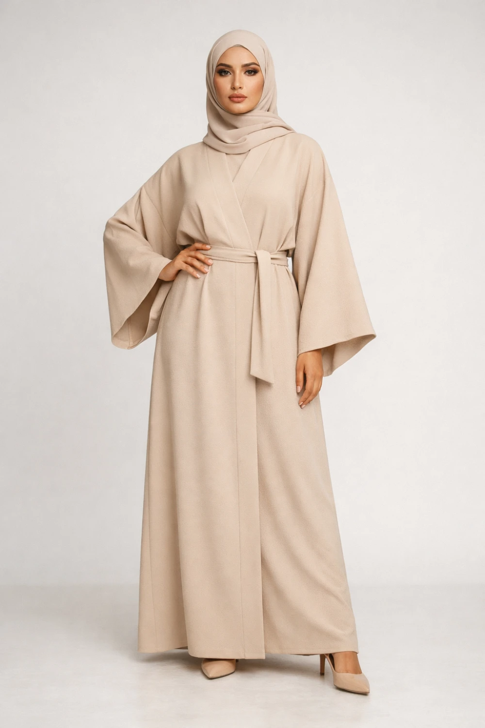 beige belted kimono sleeve abaya modern modest fashion outfit elegant neutral abaya style inspiration