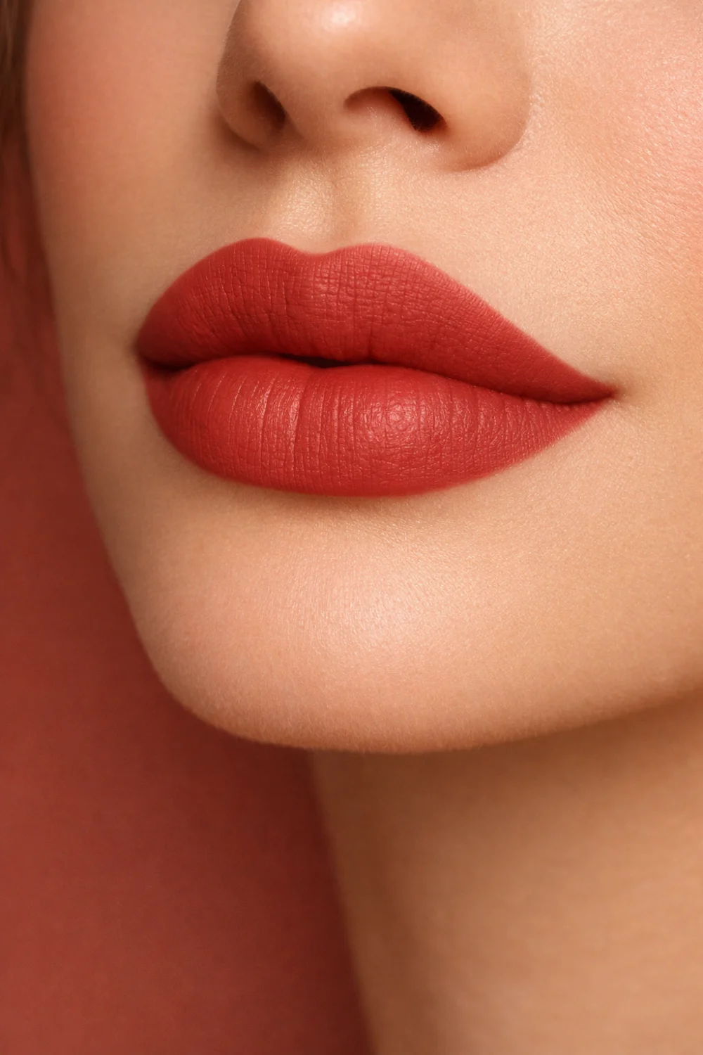 Classic coral lipstick shade on lips vibrant everyday makeup