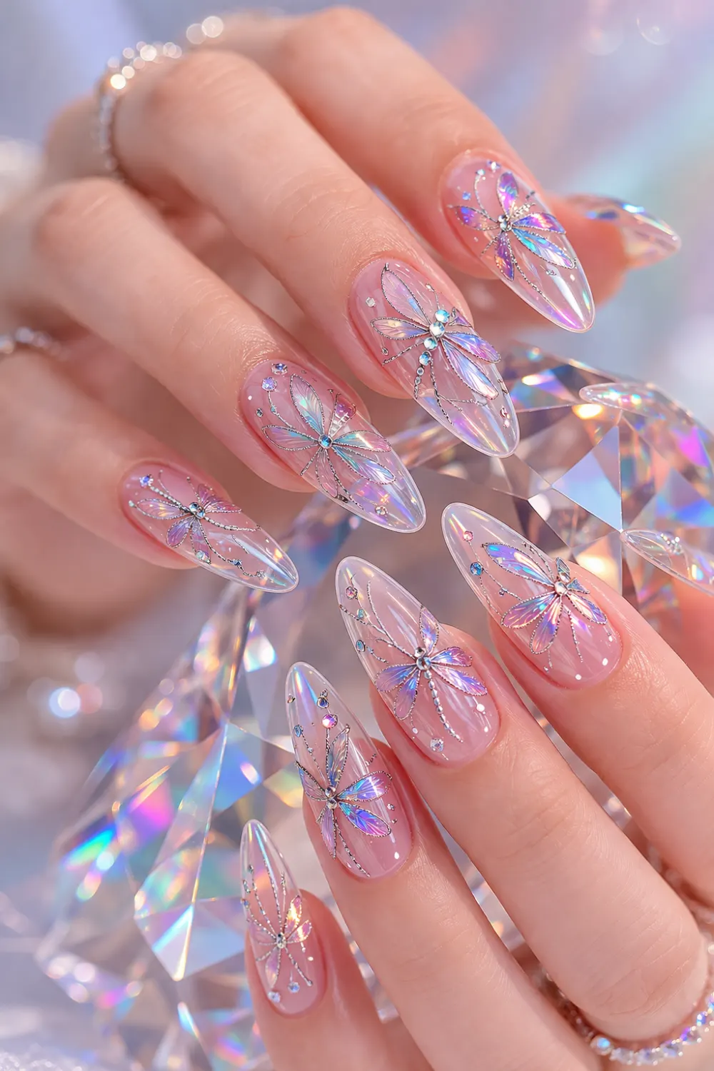 iridescent dragonfly nail art design with holographic wings on glossy almond nails, trendy manicure idea for pinterest