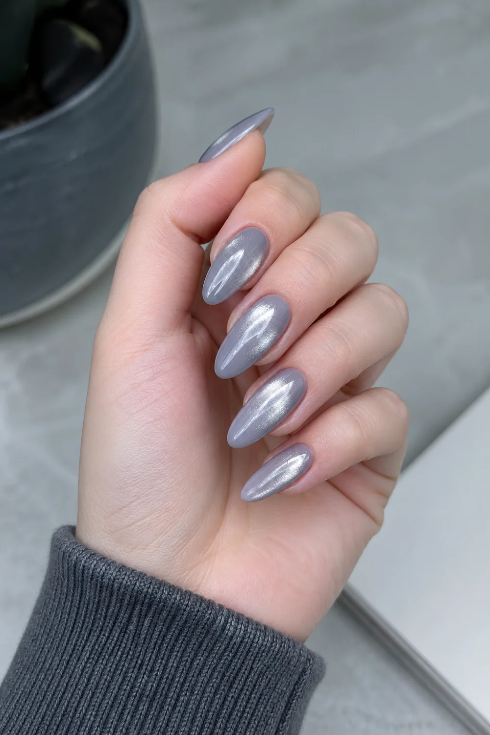 grey silver halo nails glossy almond gel nails cool grey base silver shimmer glow modern minimal manicure clean aesthetic nails trendy neutral look