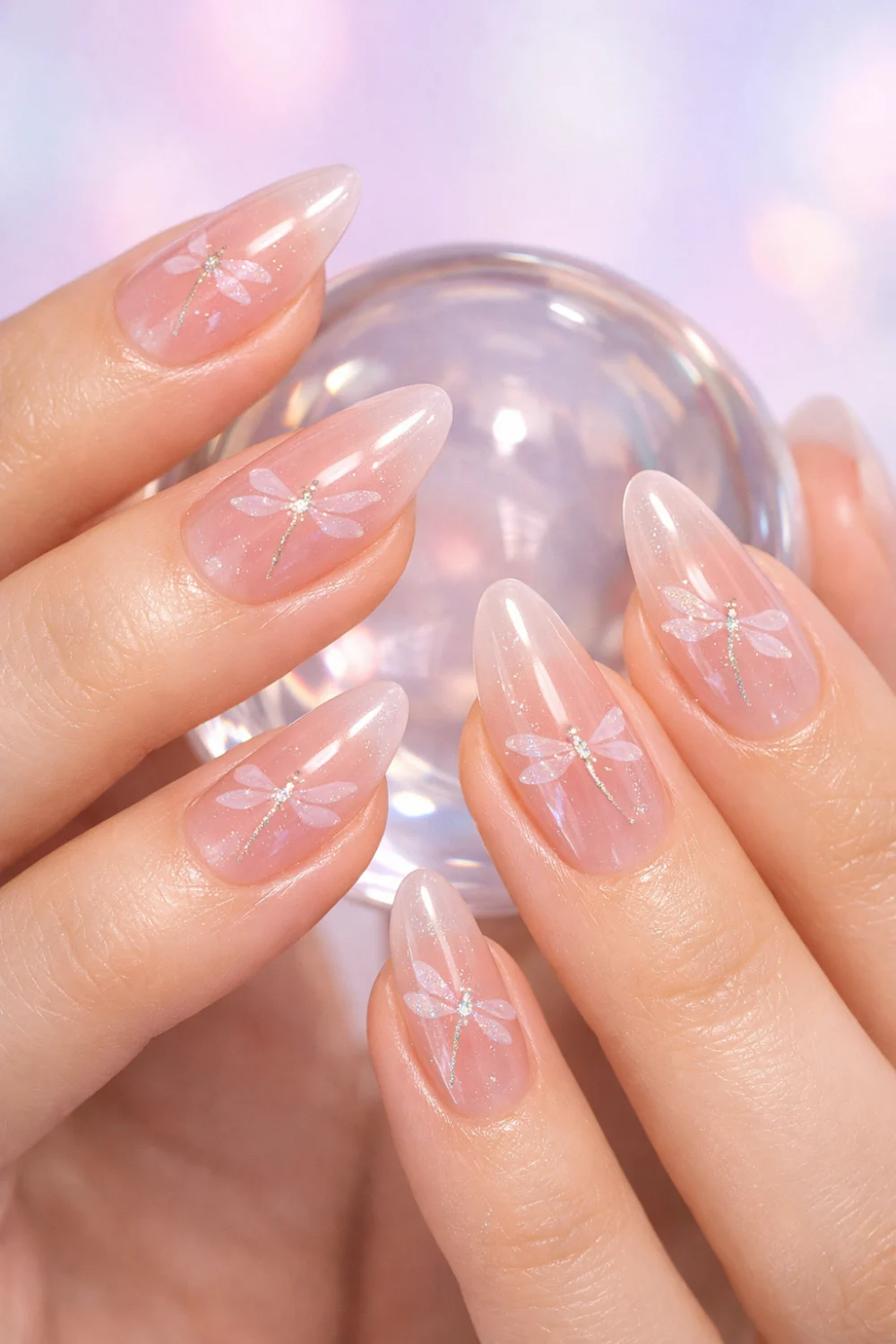 pink jelly dragonfly nail art with sheer glossy nails minimal soft manicure idea