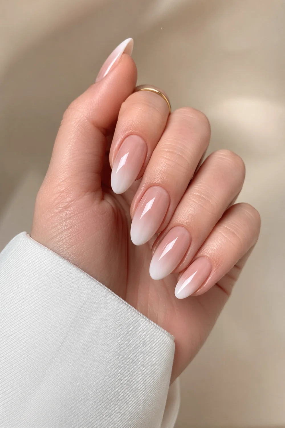 milky ombre nails nude to white gradient smooth glossy finish baby boomer nails almond shape soft elegant manicure minimal chic design