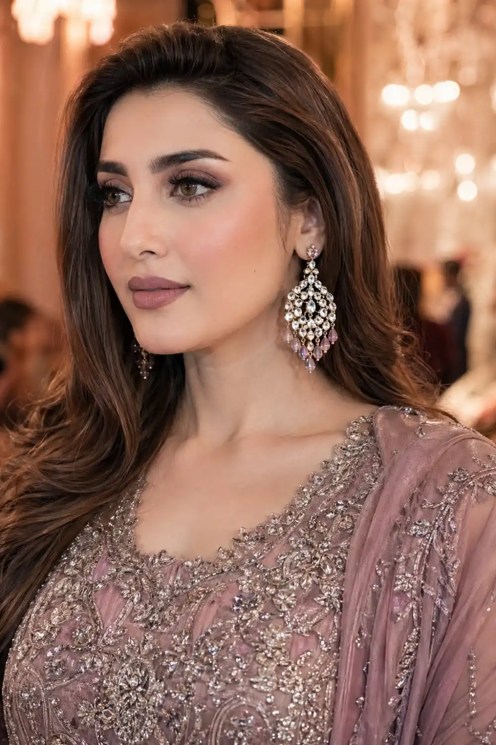 Soft mauve bridesmaid blush makeup with elegant tones, matte skin finish, subtle glam look, Pakistani bridesmaid portrait, refined bridal makeup style