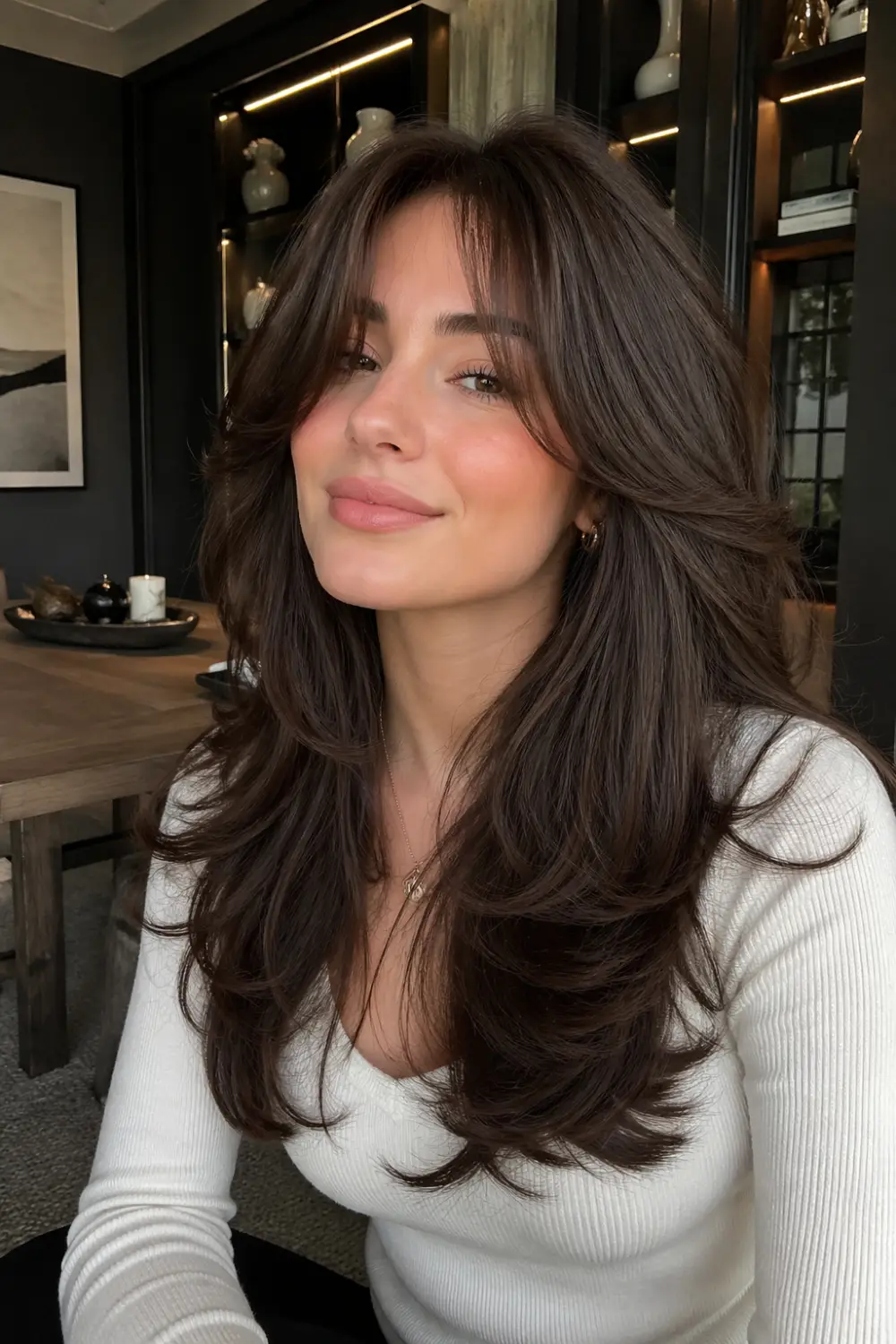 side part blowout hairstyle with deep side volume lifted roots smooth shiny hair elegant flow modern glamorous hair look