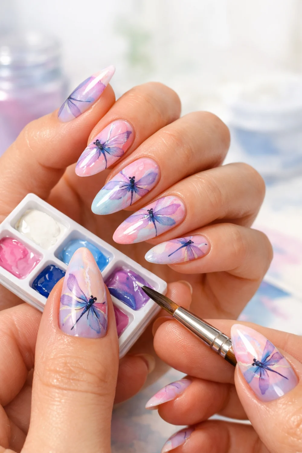 watercolor dragonfly nail art with pastel blend nails artistic manicure design inspiration