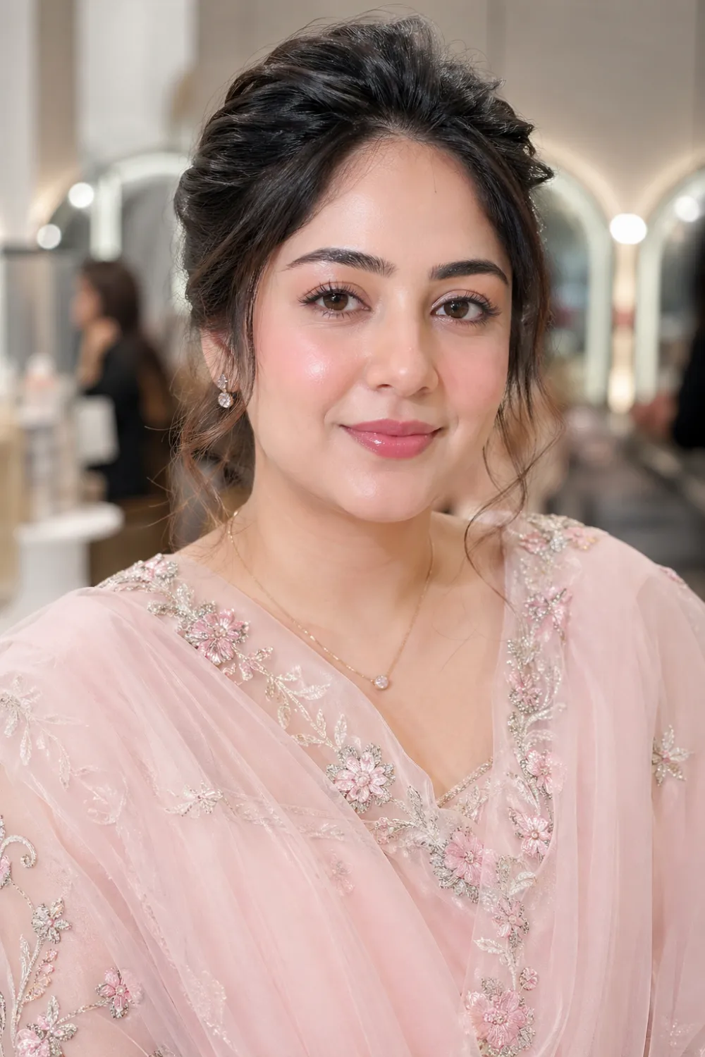 Watercolor blush bridesmaid makeup with soft diffused cheeks, natural glow, minimal makeup look, Pakistani bridesmaid portrait, dreamy soft glam style