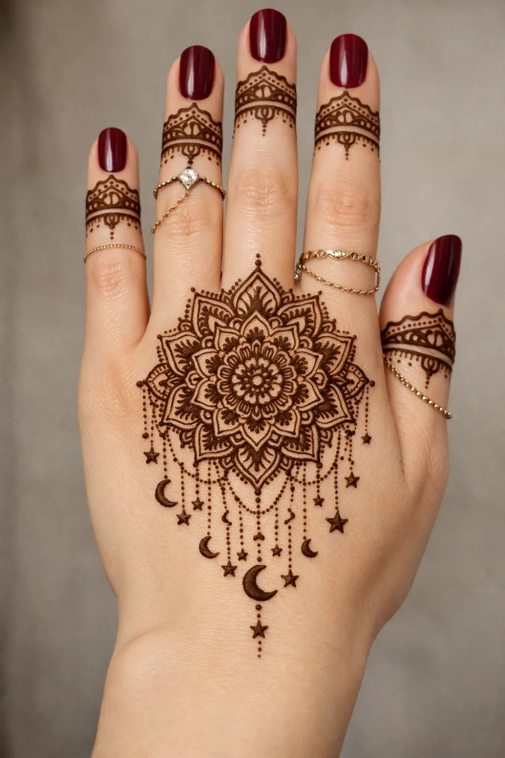 Moon and star mandala mehndi design with delicate dotted chains and celestial accents on the hand, elegant Arabic henna style perfect for festive occasions and modern mehndi trends.