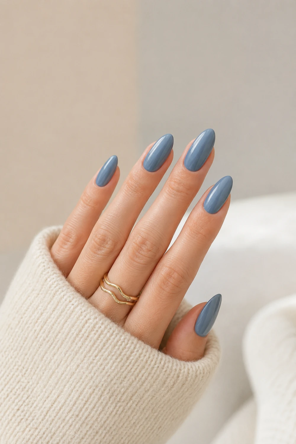 Dusty blue minimalist almond nails with glossy muted finish, elegant clean girl manicure design featuring classy Pinterest-inspired neutral beauty aesthetic.