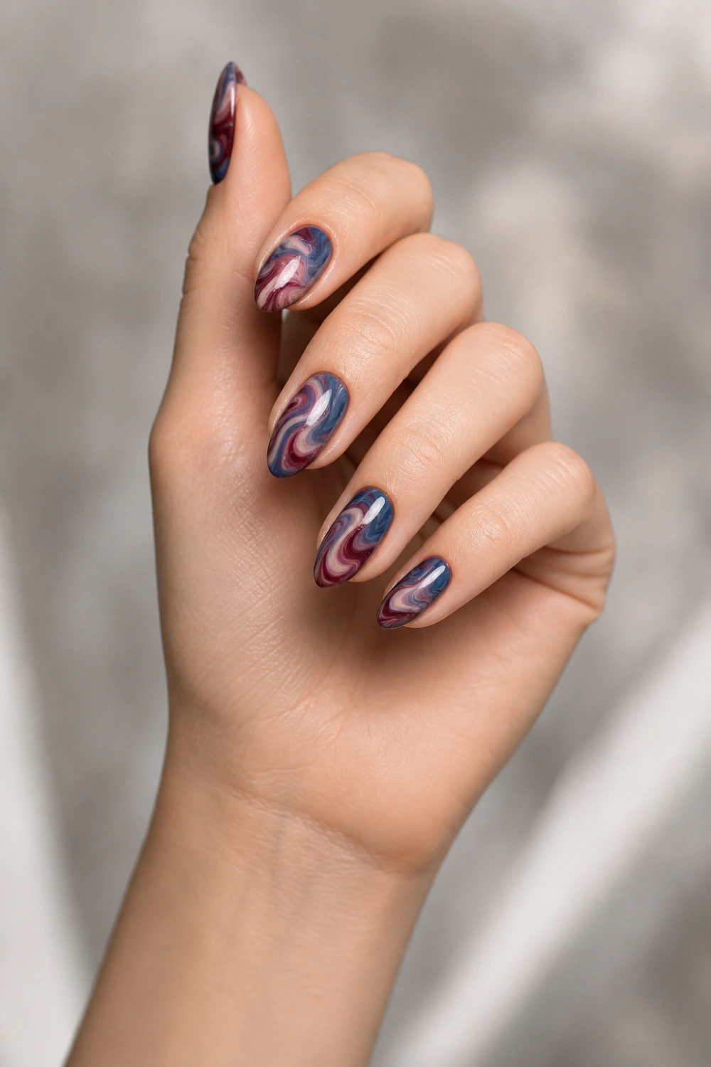 berry swirl nails pink purple blue marble swirl design glossy almond nails abstract aesthetic manicure fluid pattern