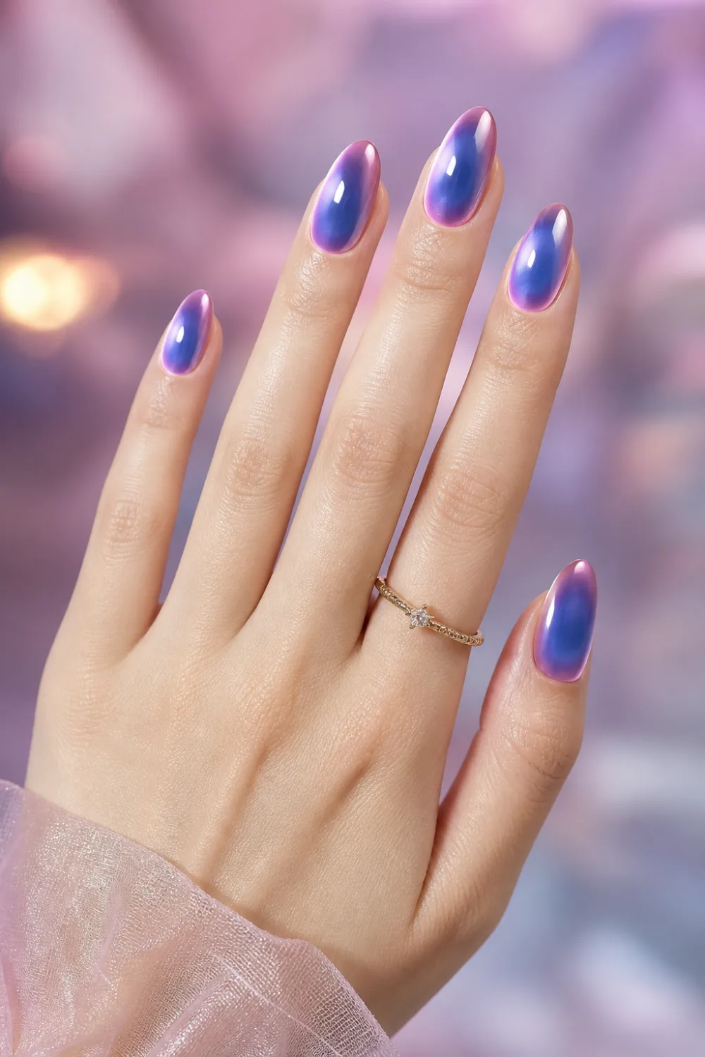 blueberry aura nails blue purple gradient glow effect glossy almond nails soft dreamy aesthetic manicure blurred background